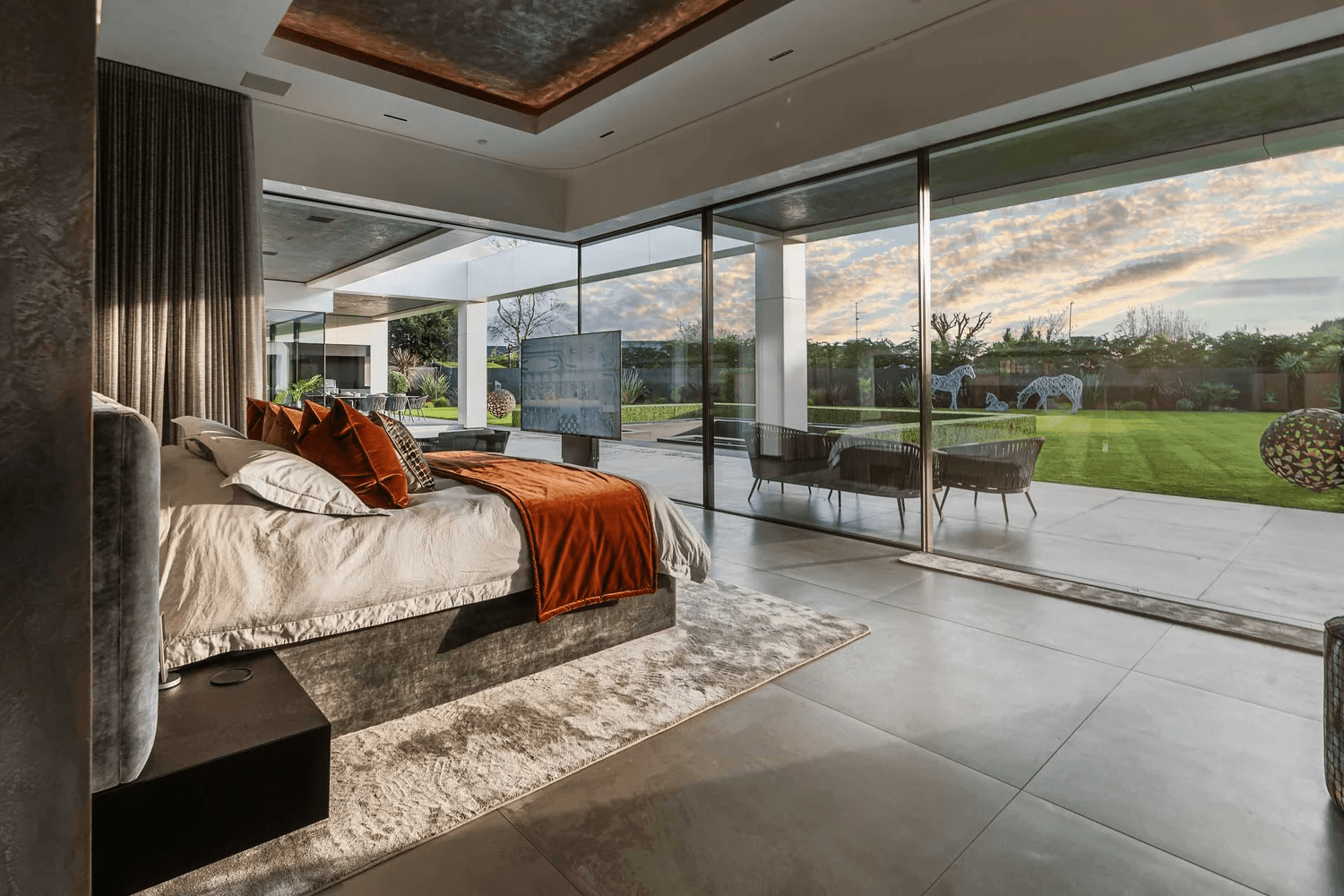 Bespoke bed with integrated under bed TV lift